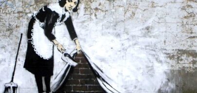 Sweeping it Under the Carpet (2006) by Banksy